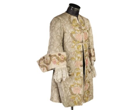 * Theatre Costume. An embroidered brocade frock coat, worn at the ballet 'Louis XV', Monte Carlo, 1922, handmade coat in crea