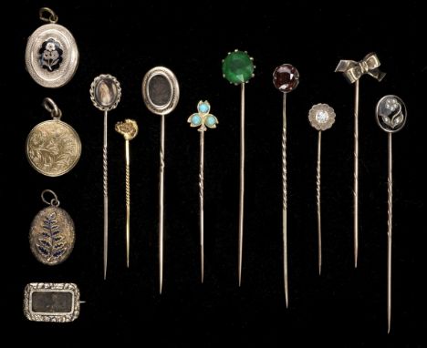 * Tie Pins. A collection of tie pins, including a gold nugget, 4.7 cm long, 1.3g, plus a Victorian yellow metal mourning broo