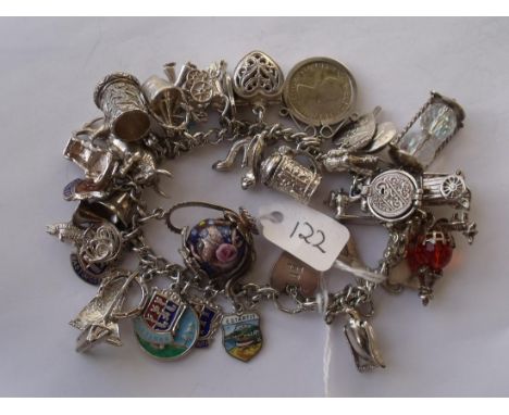 Vintage silver charm bracelet (112.6 grams).    