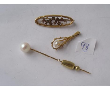 18ct gold pearl top stick pin also a 9ct  brooch and a 9ct charm      