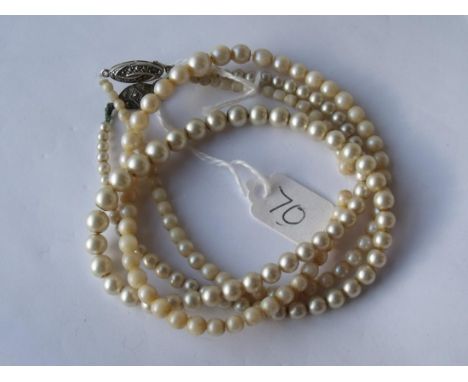 Two vintage pearl necklaces with silver clasps   