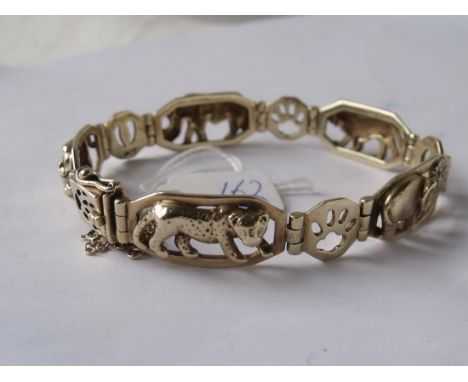 HEAVY 9CT VINTAGE PANEL BRACELET  depicting jungle animals on each panel  7.5" dia and 29.4g       