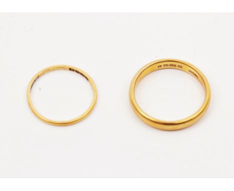 Two hallmarked 22ct yellow gold wedding bands, ring sizes J, N