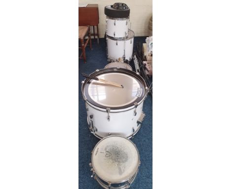 A full set of pearl white cased drum set with stands, sticks, twelve Cymbals to include several Sabian, Zildjian, Planet Z, t