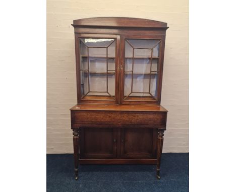 A converted Victorian mahogany upright piano converted to desk/cabinet.