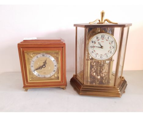 A Mappin and Webb Elliott London mantle clock together with a Kundo brass anniversary mantle clock.