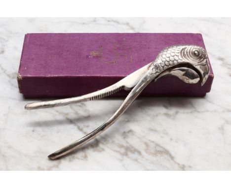 Nutcrackers - a silver plated novelty lever-action nut cracker, attributed to Asprey, London, cast as the head of a parrot, 1