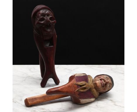 Nutcrackers - a Black Forest novelty lever-action nut cracker, carved and painted as a bust length portrait of a man, in trad