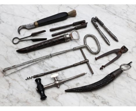 A 19th century cellar or bar tool, by Joseph Rodgers, Sheffield, hooked blade, brush to terminal, 20.5cm long; a 19th century
