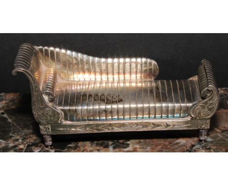 An Elizabeth II silver miniature model, of a sofa or daybed, 9cm wide, London, 1953 