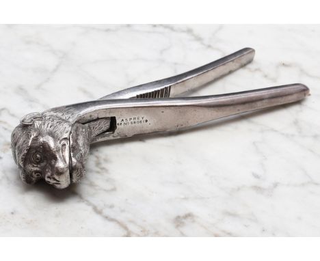 Nutcrackers - an early 20th century silver plated novelty lever-action nut cracker, cast as the head of a monkey, 16cm long, 