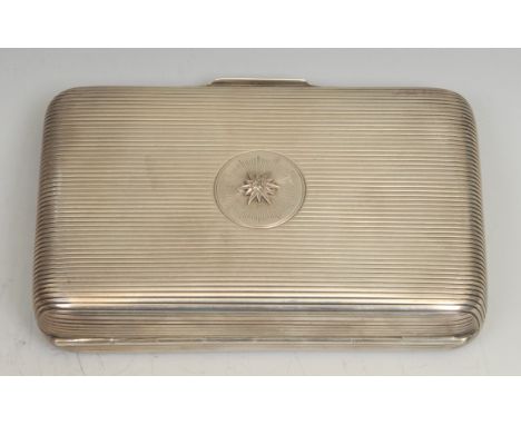 A Victorian diamond set silver rounded rectangular cigar case, reeded overall, the hinged cover centred by an old-cut stone w