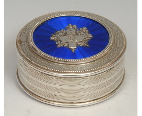 A French silver and enamel circular table snuff box, the push-fitting cover centred by a fasces on radiating Bleu Royale grou