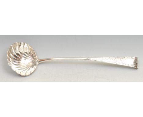 A George III Irish silver Old English pattern soup ladle, shell bowl, chased stem, 36cm long, Dublin 1786, 242g 