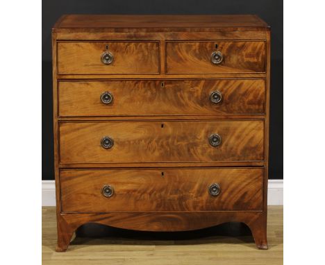 A Regency mahogany caddy top chest, of two short and three long graduated cockbeaded drawers, serpentine apron, outswept fore