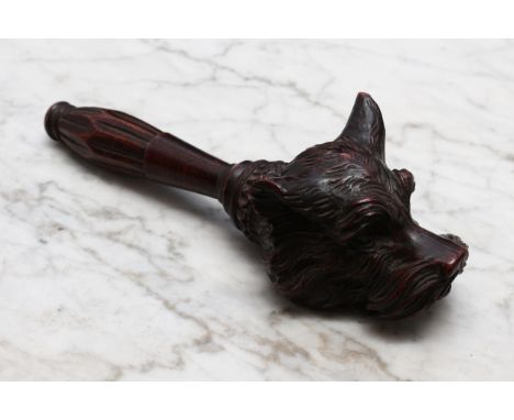 Nutcrackers - a Black Forest novelty screw-action nut cracker, carved as a the head of a terrier dog, lotus handle, 19.5cm lo