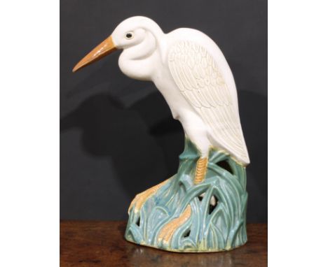 A large mid-20th century Bohemian ceramic model, possibly Bechyně, of an egret, 63cm high 