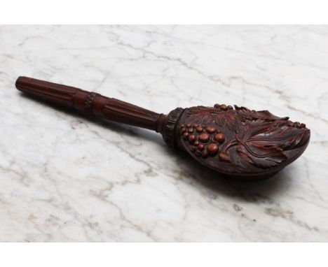 Nutcrackers - a Black Forest novelty screw-action nut cracker, carved with fruiting vine, lotus grip, 26cm long, c.1870 