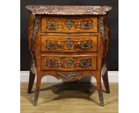 A 19th century French Louis XV Revival bois de rose, kingwood and marquetry serpentine commode, marble top above three frieze