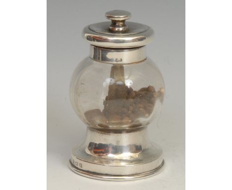 An Edwardian silver and glass pepper mill or grinder, 9cm high, William Hutton &amp; Sons Ltd, Birmingham 1909 