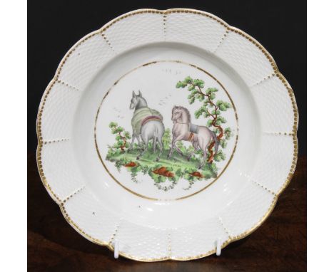 A Worcester Aesop Fable shaped circular plate, painted in polychrome with horses, osier border, gilt dentil rim, 20.5cm diam,