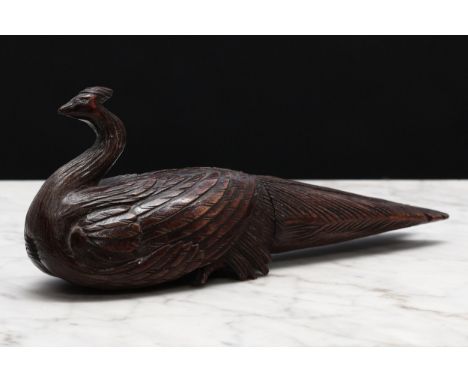 Nutcrackers - a Black Forest novelty screw-action nut cracker, carved as a bird, 19.5cm long, c.1870 