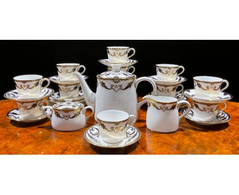 A Royal Crown Derby Majesty tea service for twelve, comprising teapot, sucrier and cover, cream jug, side plates, cups and sa