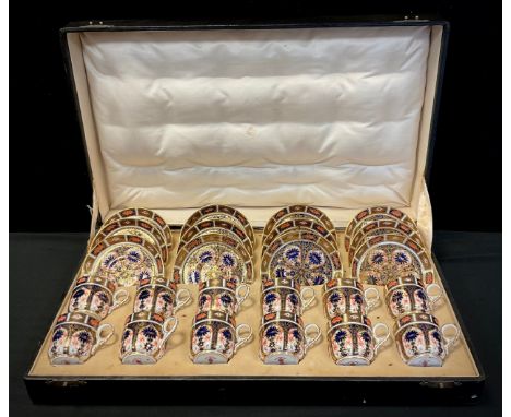 A set of twelve Royal Crown Derby 1128 Imari pattern coffee cans and saucers, first quality, impressed and printed mark in re