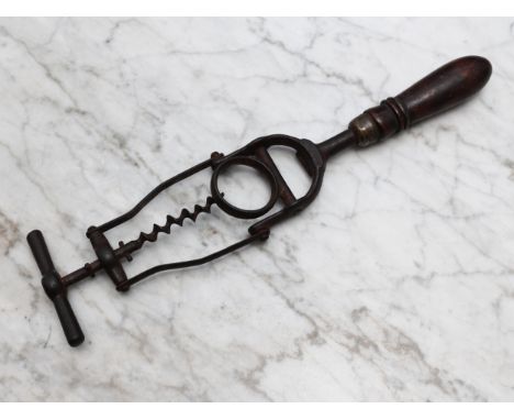 Helixophilia - an unusual early 20th century lever corkscrew, pivoting mechanism with neck ring, turned handle, 32.5cm long o
