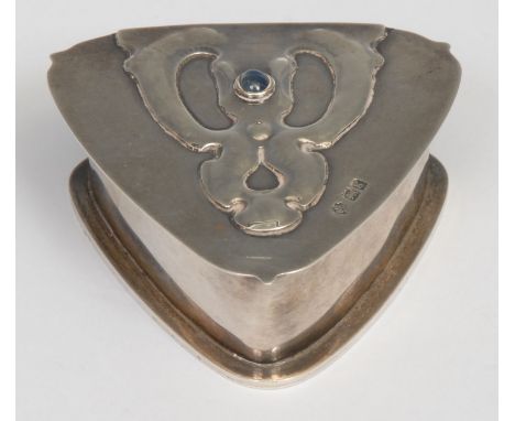 An Art Nouveau silver triform box, hinged cover chased with a stylised organic motif, set with a blue cabochon, 8cm wide, Wil