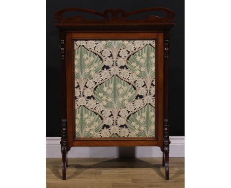 An Art Nouveau mahogany fire screen, shaped cresting pierced with stylised flowers on whiplash stems, Voysey style banner fla