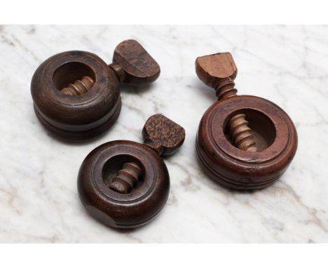 Nutcrackers - a 19th century ring shaped screw-action pocket nut cracker, 5.5cm diam; others, similar (3) 