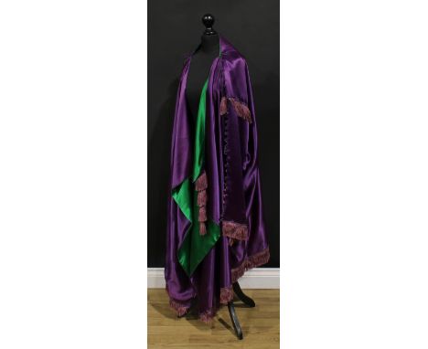 Vintage Fashion - a Paul Poiret (1879 - 1944) silk manteau, of Orientalist inspiration, the exterior in vivid purple, the int