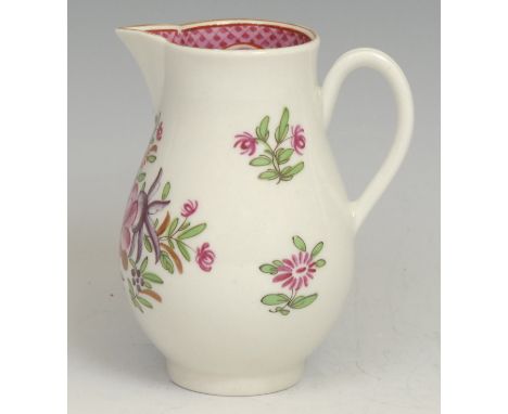 A Worcester sparrow beak jug, decorated in Chinese export style with flowers, the interior with scale pink border, ribbed loo