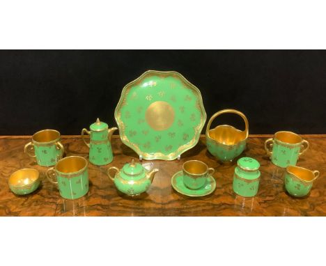 A Coalport miniature tea service, comprising teapot, coffee pot, cream jug, sugar bowl, tea cup and saucer, on shaped circula