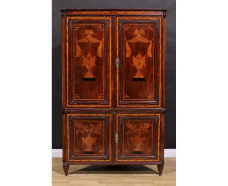 A substantial 19th century Dutch marquetry floor-standing splay-front corner cabinet, shallow moulded cornice above a pair of