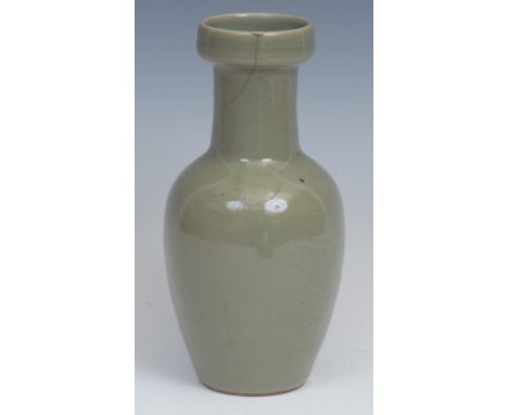 A Chinese celadon ovoid vase, incise moulded with a crane and chrysanthemums, 19.5cm high, blue seal mark, 19th century 