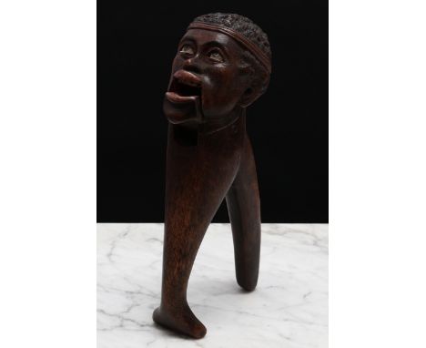 Nutcrackers - a Black Forest novelty lever-action nut cracker, carved as the head of an African-American boy, painted feature