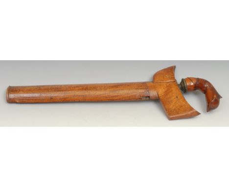An Indonesian kris, 33.5cm wavy blade with pronounced pamor, hardwood hulu carved as a stylised lotus, wooden scabbard, 44cm 