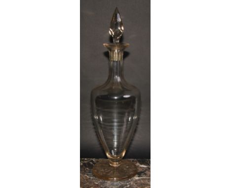 A large 19th century glass ovoid pedestal decanter, pointed prismatic stopper, star-cut base, 55cm high, c.1860 