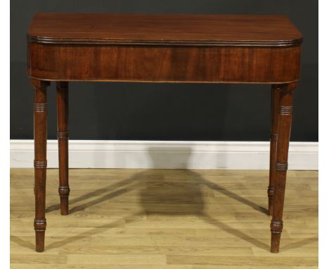 A 19th century mahogany tea table, hinged top with reeded edge above a deep frieze, ring-turned legs, 75cm high, 91cm wide, 4