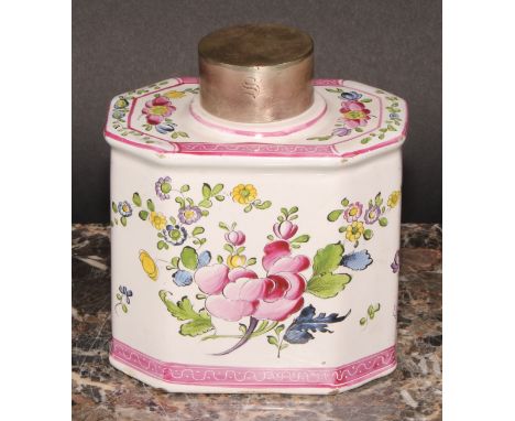 A 19th century Continental faience octagonal tea caddy and cover, painted with stylised flowers, outlined in black, pink sgra