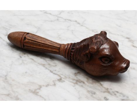 Nutcrackers - a Black Forest type walnut novelty screw-action nut cracker, carved as the head of a bull, lotus grip, 21cm lon