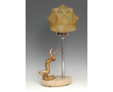 An Art Deco table lamp, the oval onyx base mounted with gilt metal female dancer, frosted amber glass polyhedron shade on chr