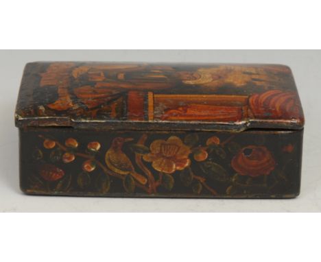 A Persian papier-mâché rectangular snuff box, hinged cover decorated with a figure of the court, seated on a tiger skin rug, 