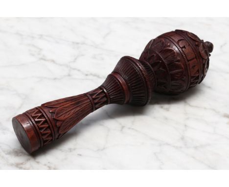 Nutcrackers - a 19th century Swiss acorn shaped screw-action nut cracker, the chamber and haft carved with lotus, incised Rig