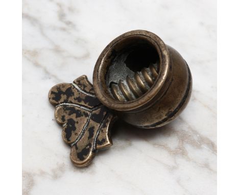 Nutcrackers - an 18th century brass screw-action pocket nut cracker, cauldron shaped receptacle, shaped thumb-piece centred b