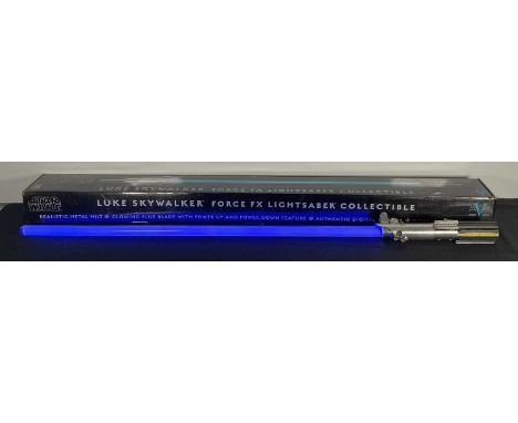 STAR WARS - A Master Replica Luke Skywalker Force FX Light Saber, with display stand, in original box. 1:1 Scale.These items 