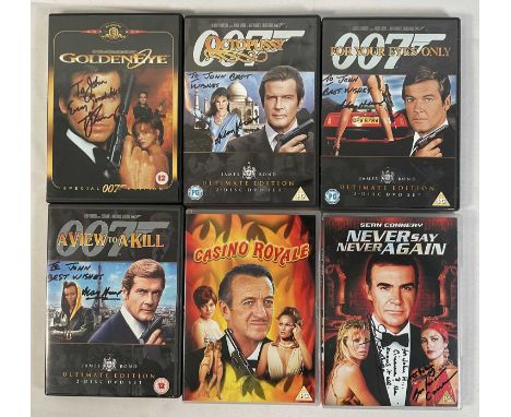 A group of 6 autographed James Bond DVDs comprising CASINO ROYALE (1967) signed by Costume Designer JULIE HARRIS, NEVER SAY N