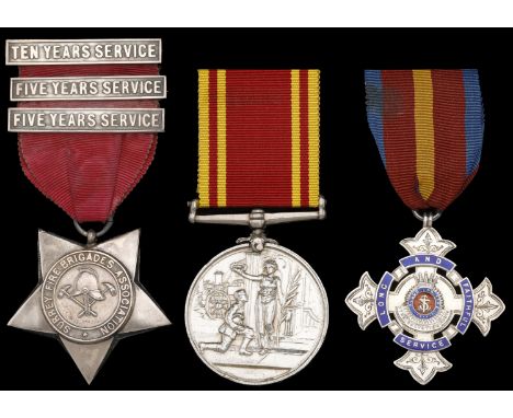 Surrey Fire Brigades Association Star, silver, with one ‘Ten Years Service’ and two ‘Five Years Service’ pin-backed silver ba